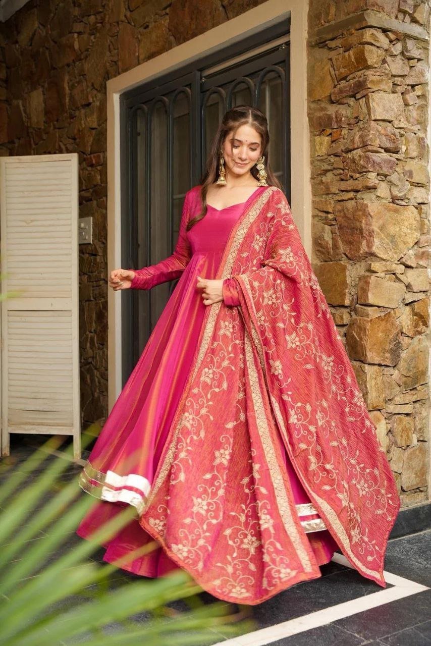 8d9847a7-9a6c-404e-8606-c0ddb7b7c287.jpg Pink Premium Vichitra Blooming Designer Gown with Dupatta – Zari & Sequins Embroidery