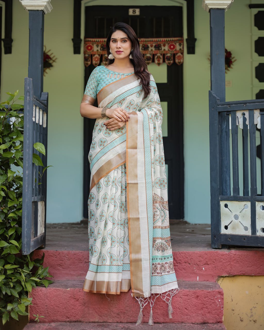 chic off white & turquoise linen cotton saree with geometric motifs chic off white & turquoise linen cotton saree with geometric motifs