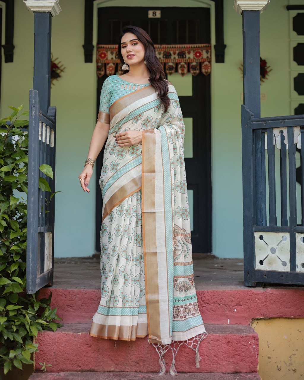 chic off white & turquoise linen cotton saree with geometric motifs chic off white & turquoise linen cotton saree with geometric motifs