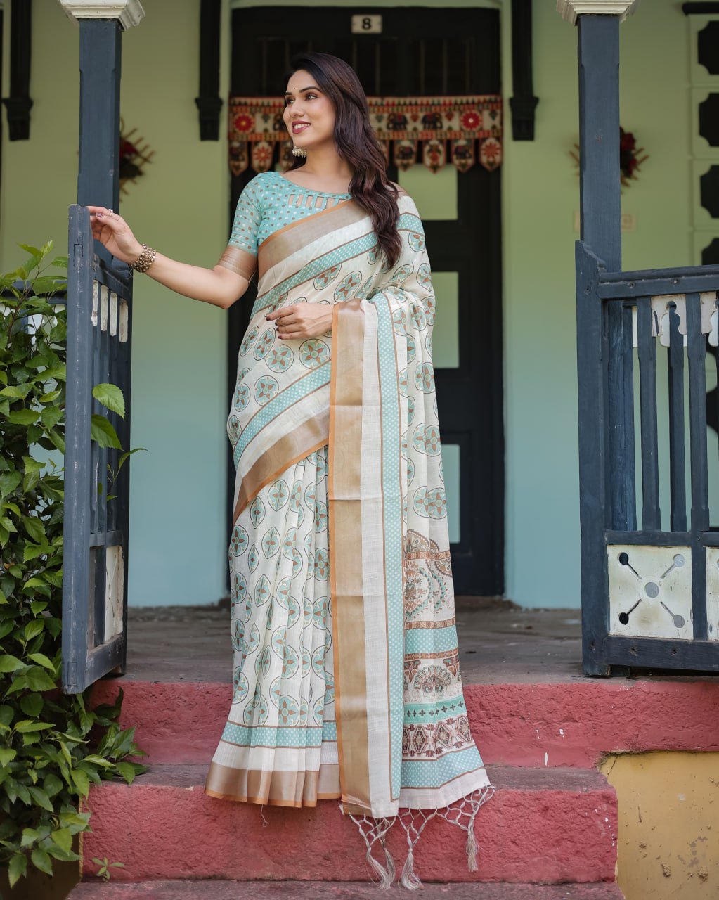 chic off white & turquoise linen cotton saree with geometric motifs chic off white & turquoise linen cotton saree with geometric motifs