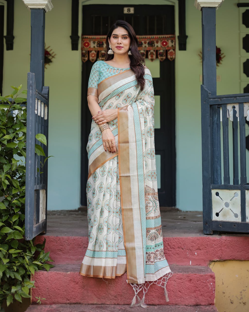 chic off white & turquoise linen cotton saree with geometric motifs chic off white & turquoise linen cotton saree with geometric motifs