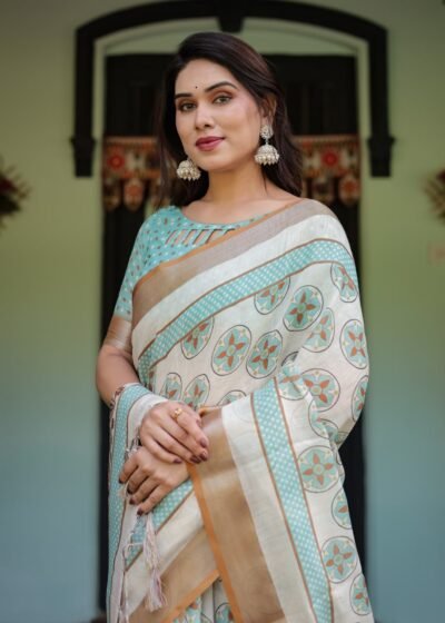 chic off white & turquoise linen cotton saree with geometric motifs