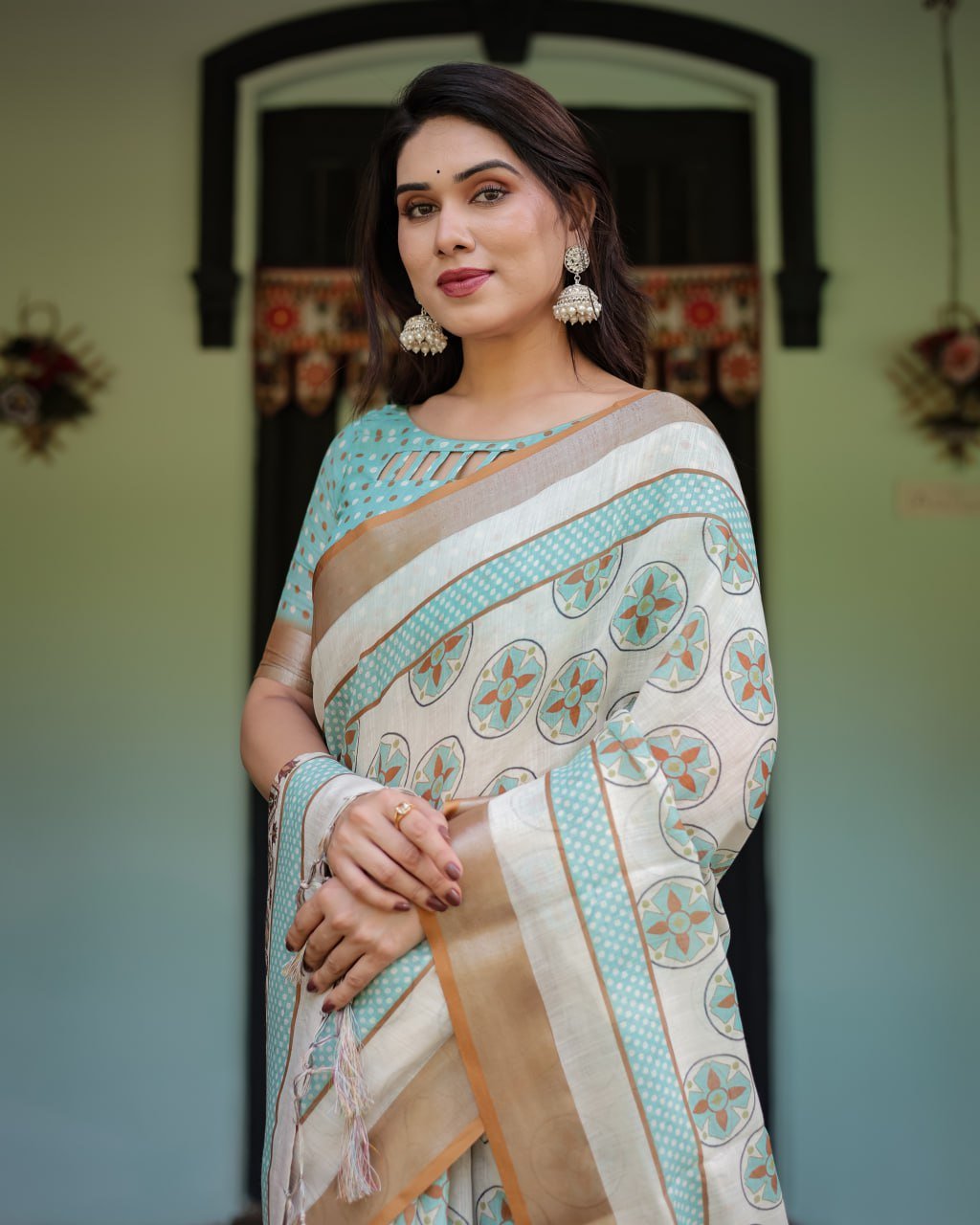 chic off white & turquoise linen cotton saree with geometric motifs chic off white & turquoise linen cotton saree with geometric motifs