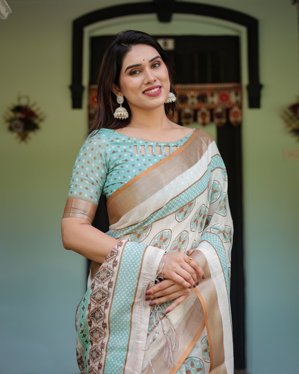 chic off white & turquoise linen cotton saree with geometric motifs chic off white & turquoise linen cotton saree with geometric motifs